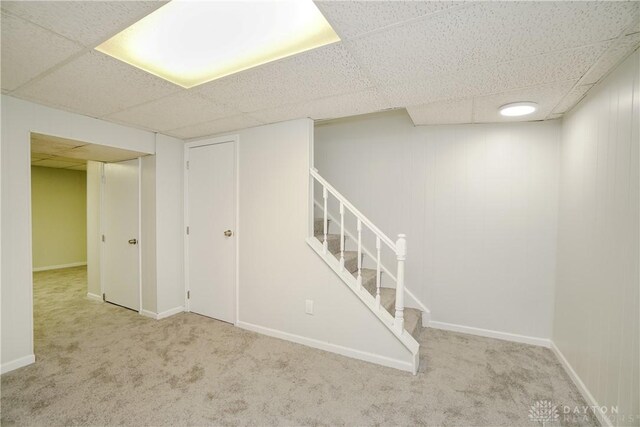 9446 Haddington Ct Unit 200, Cincinnati, OH 45251 - finished below grade area featuring a drop ceiling, stairway, and carpet floors