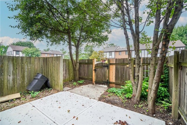 9446 Haddington Ct Unit 200, Cincinnati, OH 45251 - fenced backyard featuring a patio area and a residential view