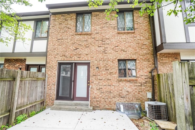 9446 Haddington Ct Unit 200, Cincinnati, OH 45251 - view of front of house featuring brick siding and a patio area