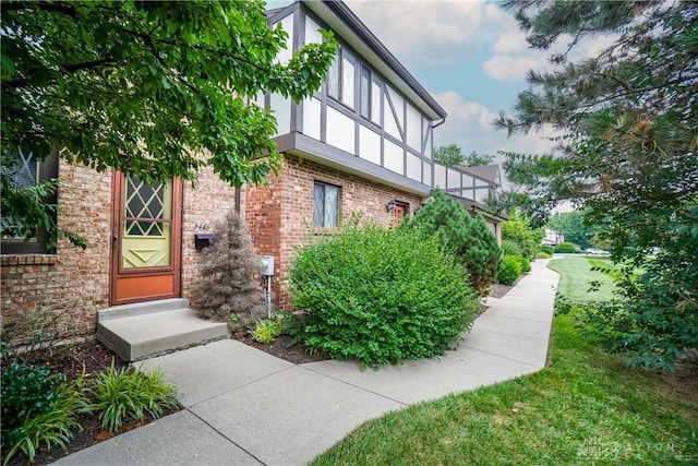 9446 Haddington Ct Unit 200, Cincinnati, OH 45251 - doorway to property featuring brick siding and stucco siding