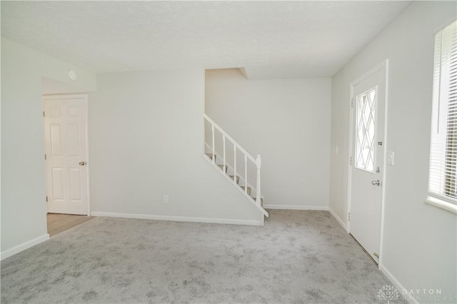 9446 Haddington Ct Unit 200, Cincinnati, OH 45251 - entrance foyer with carpet floors and stairs
