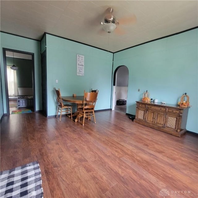 300 S Evans St, Saratoga, IN 47382 - dining room featuring arched walkways and light wood finished floors