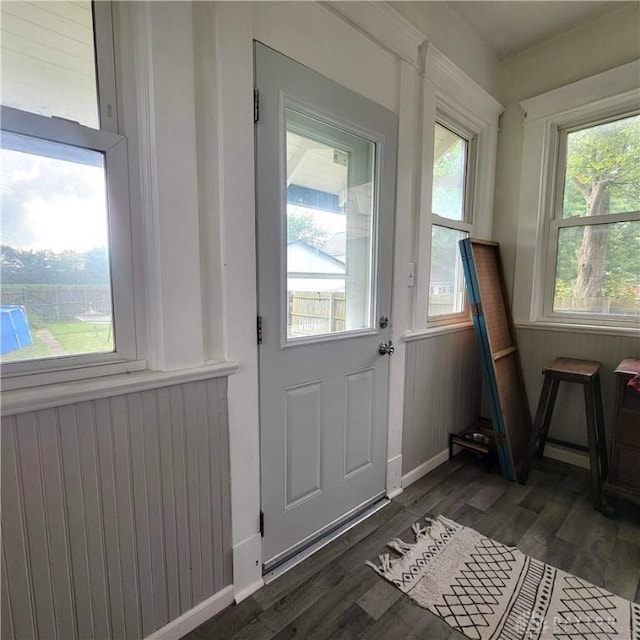 300 S Evans St, Saratoga, IN 47382 - entryway with wood finished floors, wooden walls, and wainscoting