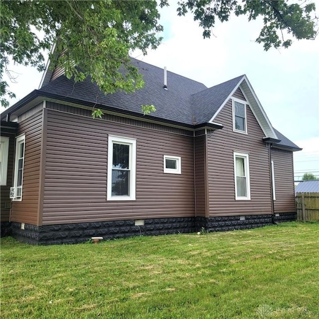300 S Evans St, Saratoga, IN 47382 - view of side of home featuring crawl space, a yard, and a shingled roof