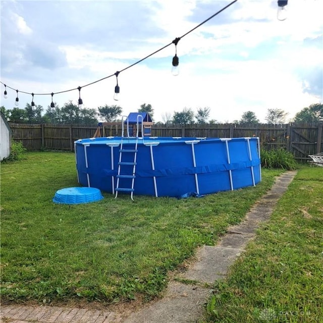 300 S Evans St, Saratoga, IN 47382 - view of pool featuring a fenced backyard