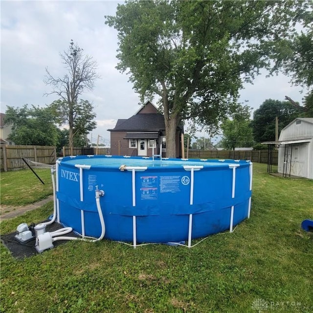 300 S Evans St, Saratoga, IN 47382 - view of pool featuring a storage unit