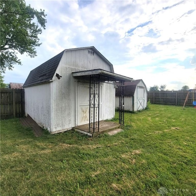 300 S Evans St, Saratoga, IN 47382 - view of shed featuring a fenced backyard and a playground