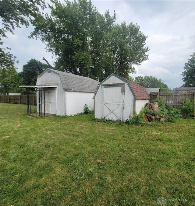 300 S Evans St, Saratoga, IN 47382 - fenced backyard featuring a shed