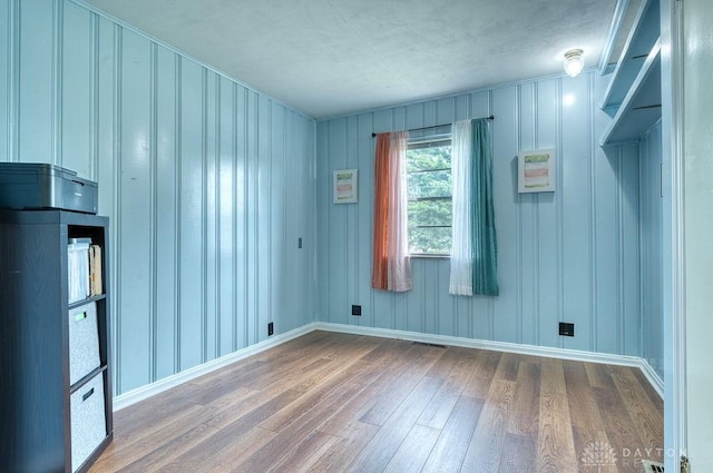 3318 US Route 42, Cedarville Twp, OH 45314 - unfurnished room featuring wood finished floors and baseboards