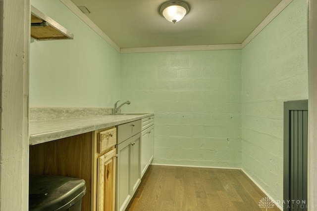 3318 US Route 42, Cedarville Twp, OH 45314 - washroom featuring dark wood-style flooring, crown molding, and wet bar