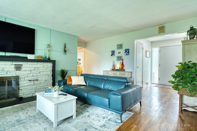 3318 US Route 42, Cedarville Twp, OH 45314 - living area with a fireplace and wood finished floors