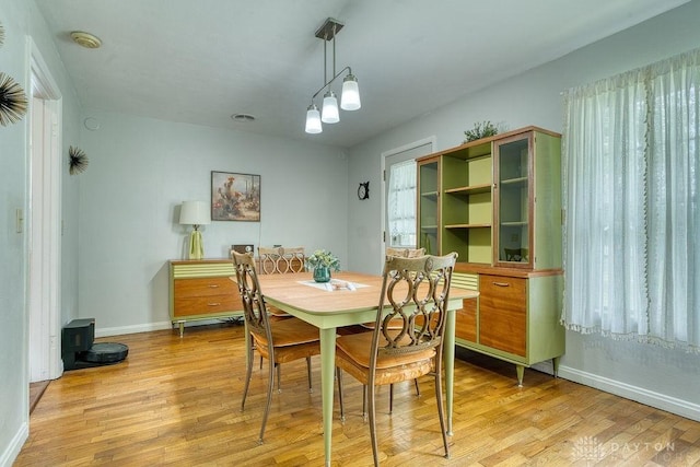 3318 US Route 42, Cedarville Twp, OH 45314 - dining area featuring baseboards and light wood-style flooring