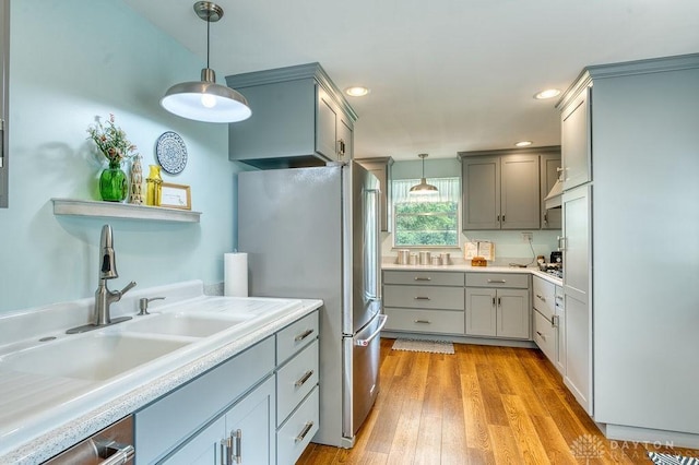 3318 US Route 42, Cedarville Twp, OH 45314 - kitchen with freestanding refrigerator, gray cabinets, pendant lighting, light countertops, and recessed lighting