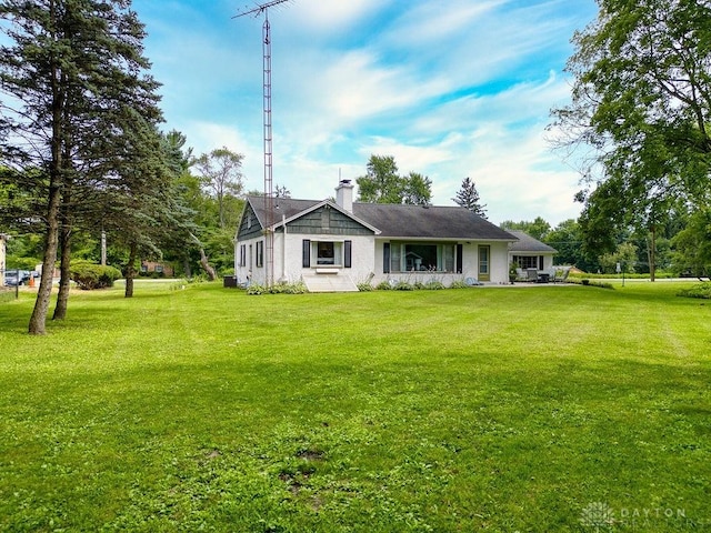 3318 US Route 42, Cedarville Twp, OH 45314 - view of front of home featuring a front lawn and a chimney