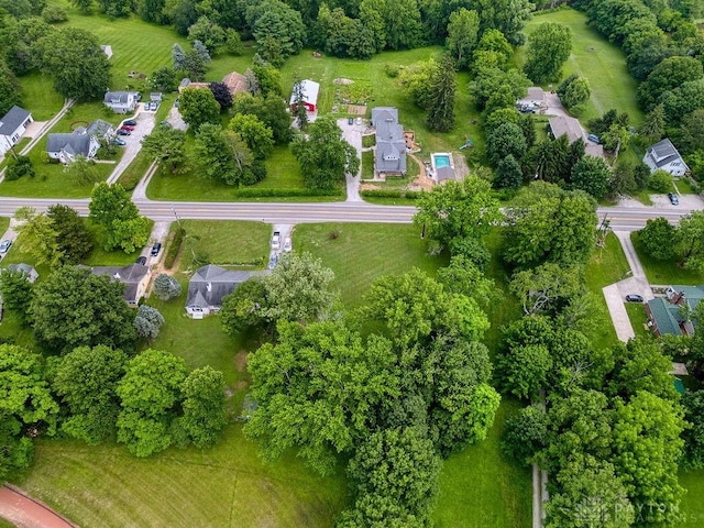 3318 US Route 42, Cedarville Twp, OH 45314 - aerial view of property and surrounding area featuring a tree filled landscape