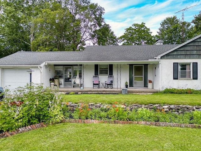 3318 US Route 42, Cedarville Twp, OH 45314 - single story home with a garage, covered porch, a front yard, and stucco siding