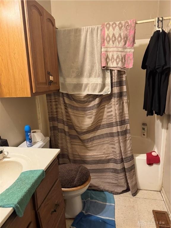 8211 Sue Ave, Franklin, OH 45005 - bathroom with vanity, tile patterned flooring, and shower / tub combo