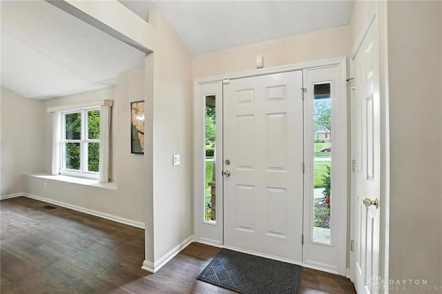 2210 Hidden Woods Blvd, Beavercreek, OH 45431 - entryway featuring dark wood finished floors and lofted ceiling