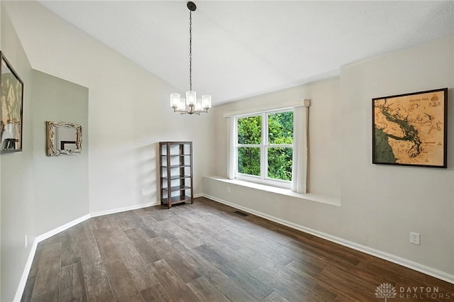 2210 Hidden Woods Blvd, Beavercreek, OH 45431 - unfurnished dining area featuring wood finished floors, a chandelier, and lofted ceiling