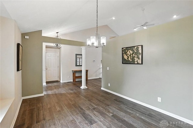 2210 Hidden Woods Blvd, Beavercreek, OH 45431 - unfurnished dining area featuring ceiling fan, wood finished floors, lofted ceiling, a chandelier, and decorative columns