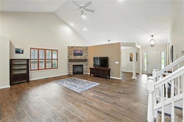 2210 Hidden Woods Blvd, Beavercreek, OH 45431 - unfurnished living room featuring decorative columns, healthy amount of natural light, a ceiling fan, high vaulted ceiling, and wood finished floors
