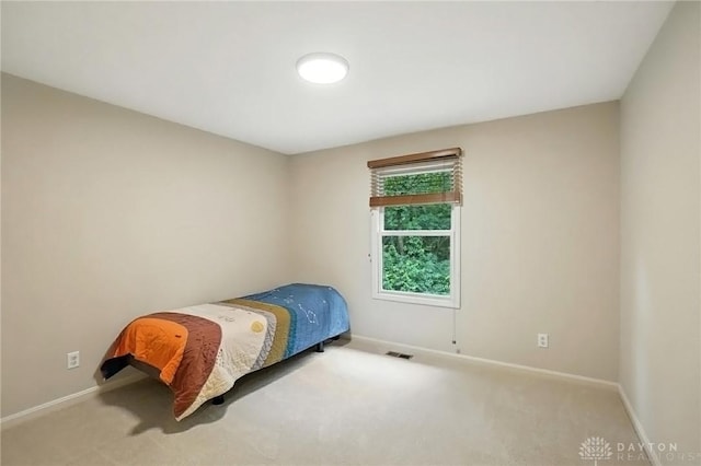 2210 Hidden Woods Blvd, Beavercreek, OH 45431 - carpeted bedroom featuring baseboards