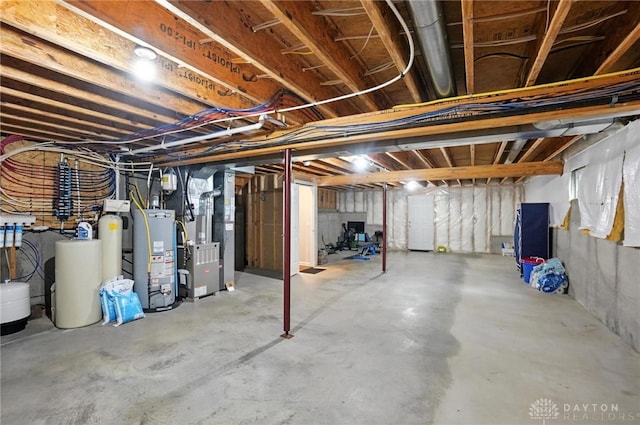 2210 Hidden Woods Blvd, Beavercreek, OH 45431 - unfinished below grade area featuring water heater, a water softener, and heating unit