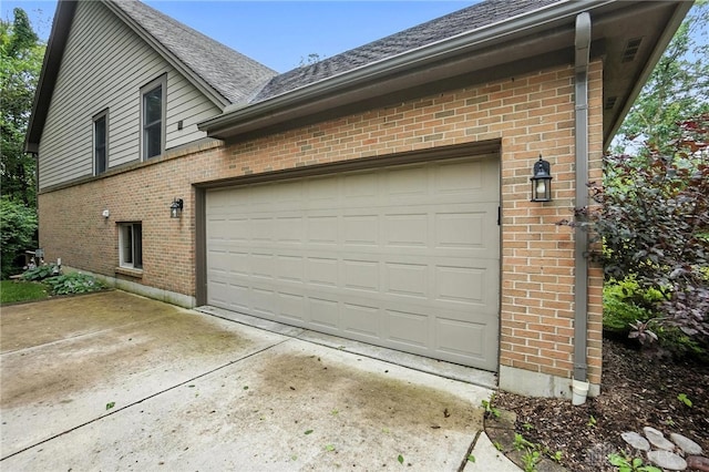 2210 Hidden Woods Blvd, Beavercreek, OH 45431 - garage featuring driveway