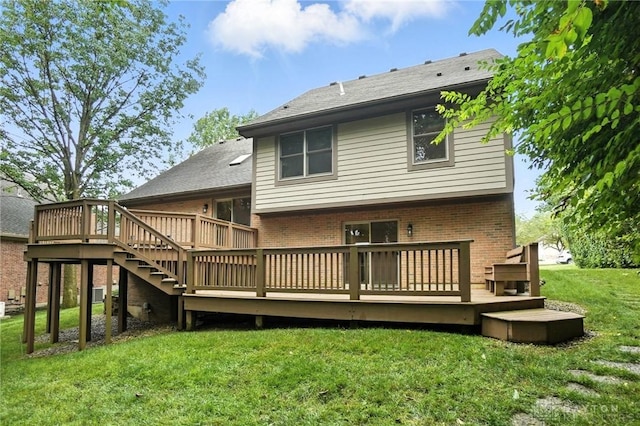 2210 Hidden Woods Blvd, Beavercreek, OH 45431 - rear view of house featuring brick siding, a wooden deck, a yard, and stairway
