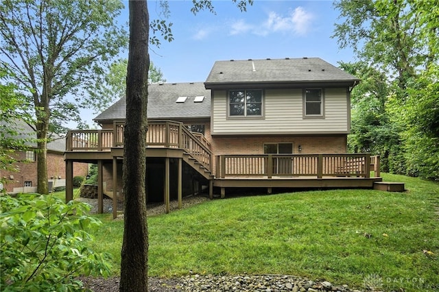 2210 Hidden Woods Blvd, Beavercreek, OH 45431 - back of house with a deck, brick siding, a lawn, stairs, and roof with shingles