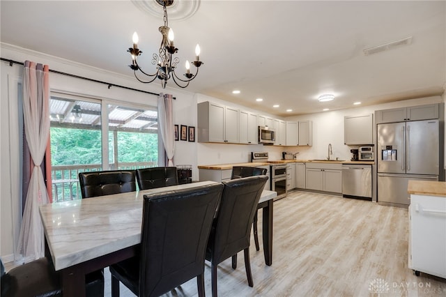 11920 State Route 725, Germantown, OH 45327 - dining room featuring a chandelier, recessed lighting, and light wood-style flooring