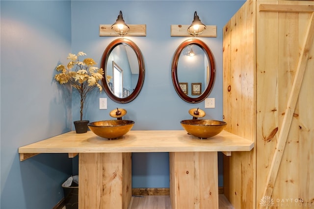 11920 State Route 725, Germantown, OH 45327 - bathroom featuring double vanity and wood finished floors