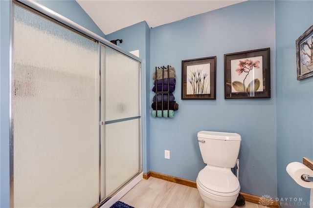 11920 State Route 725, Germantown, OH 45327 - bathroom featuring a shower stall, wood finished floors, and vaulted ceiling