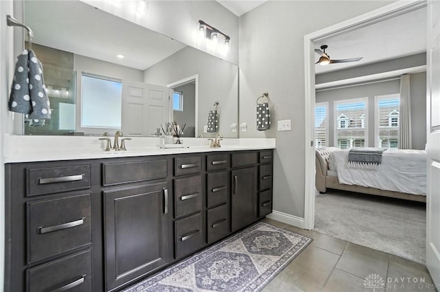 539 Bellasera Dr, Sugarcreek Twp, OH 45440 - ensuite bathroom featuring double vanity, tile patterned floors, and ceiling fan