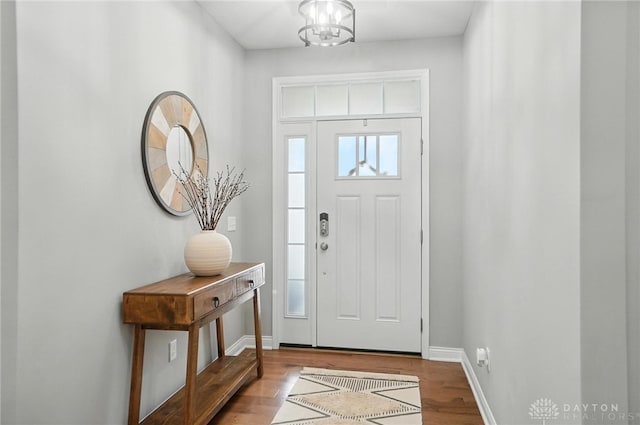 539 Bellasera Dr, Sugarcreek Twp, OH 45440 - entrance foyer featuring wood finished floors and baseboards