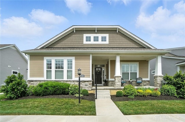 539 Bellasera Dr, Sugarcreek Twp, OH 45440 - craftsman house with covered porch and stone siding