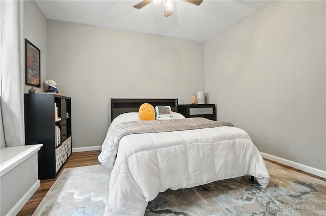 539 Bellasera Dr, Sugarcreek Twp, OH 45440 - bedroom with wood finished floors and ceiling fan