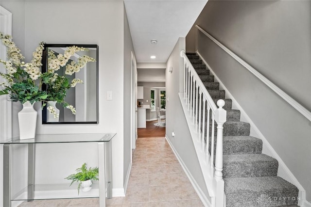 4182 Fox Fern Ct, Beavercreek, OH 45432 - stairway featuring tile patterned floors and recessed lighting