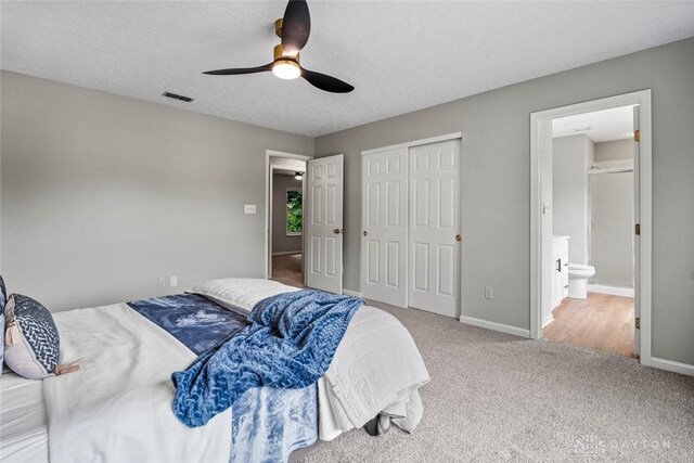 4182 Fox Fern Ct, Beavercreek, OH 45432 - bedroom with a closet, carpet floors, ceiling fan, and ensuite bath