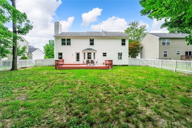 4182 Fox Fern Ct, Beavercreek, OH 45432 - rear view of house with a fenced backyard, a wooden deck, and a chimney