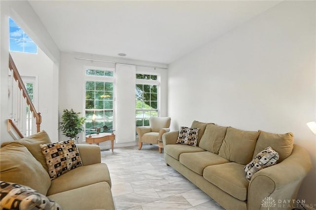 4546 Brackenview Ct, Mason, OH 45040 - living room featuring plenty of natural light, stairs, and light marble finish flooring