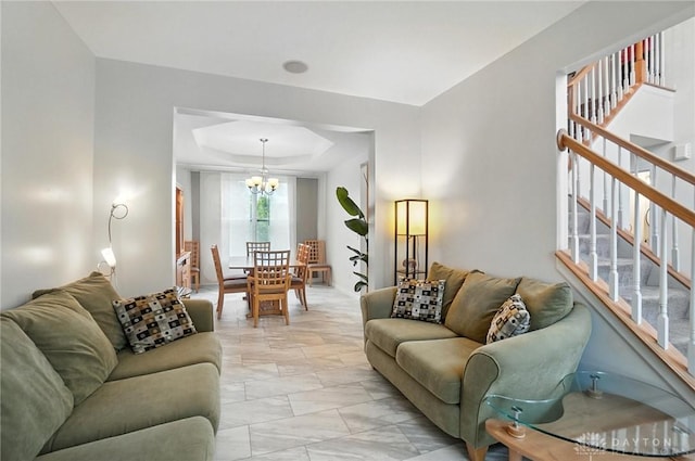 4546 Brackenview Ct, Mason, OH 45040 - living area with stairs, a chandelier, and a tray ceiling