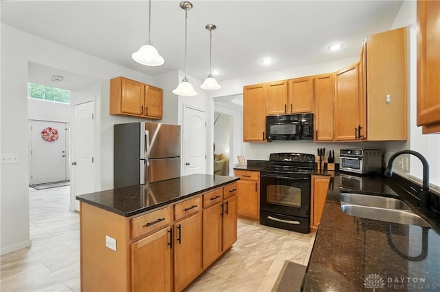 4546 Brackenview Ct, Mason, OH 45040 - kitchen with black appliances, dark stone countertops, a center island, decorative light fixtures, and recessed lighting