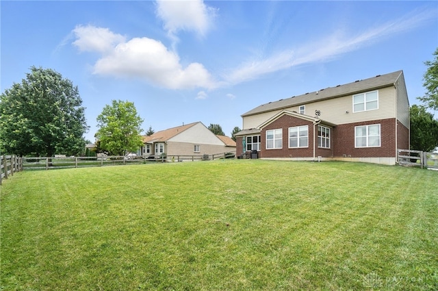 4546 Brackenview Ct, Mason, OH 45040 - rear view of property with brick siding and a fenced backyard