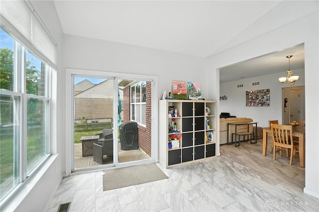4546 Brackenview Ct, Mason, OH 45040 - sunroom with plenty of natural light, lofted ceiling, and a chandelier