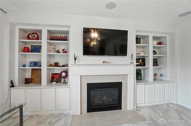 4546 Brackenview Ct, Mason, OH 45040 - living area with a tile fireplace, light marble finish floors, and built in shelves
