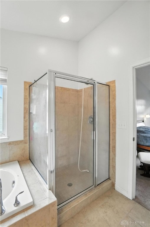 4546 Brackenview Ct, Mason, OH 45040 - ensuite bathroom with a garden tub, a shower stall, and tile patterned flooring