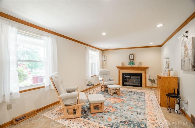 429 Rader Dr, Vandalia, OH 45377 - living area with a glass covered fireplace, crown molding, and recessed lighting
