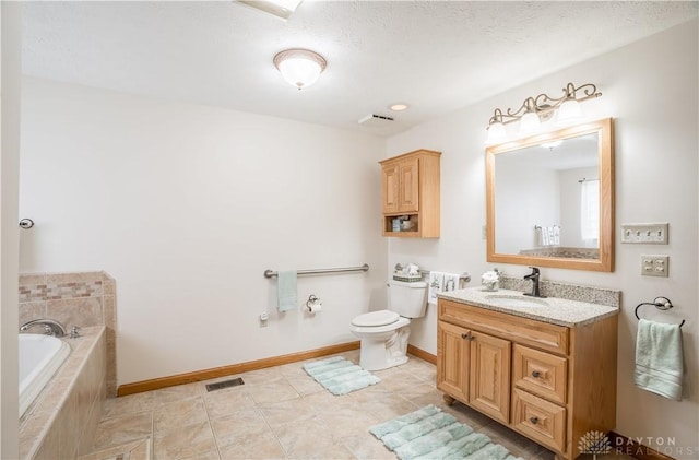 429 Rader Dr, Vandalia, OH 45377 - full bathroom featuring a garden tub, vanity, and tile patterned flooring