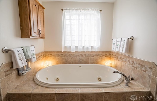 429 Rader Dr, Vandalia, OH 45377 - bathroom with a jetted tub and plenty of natural light